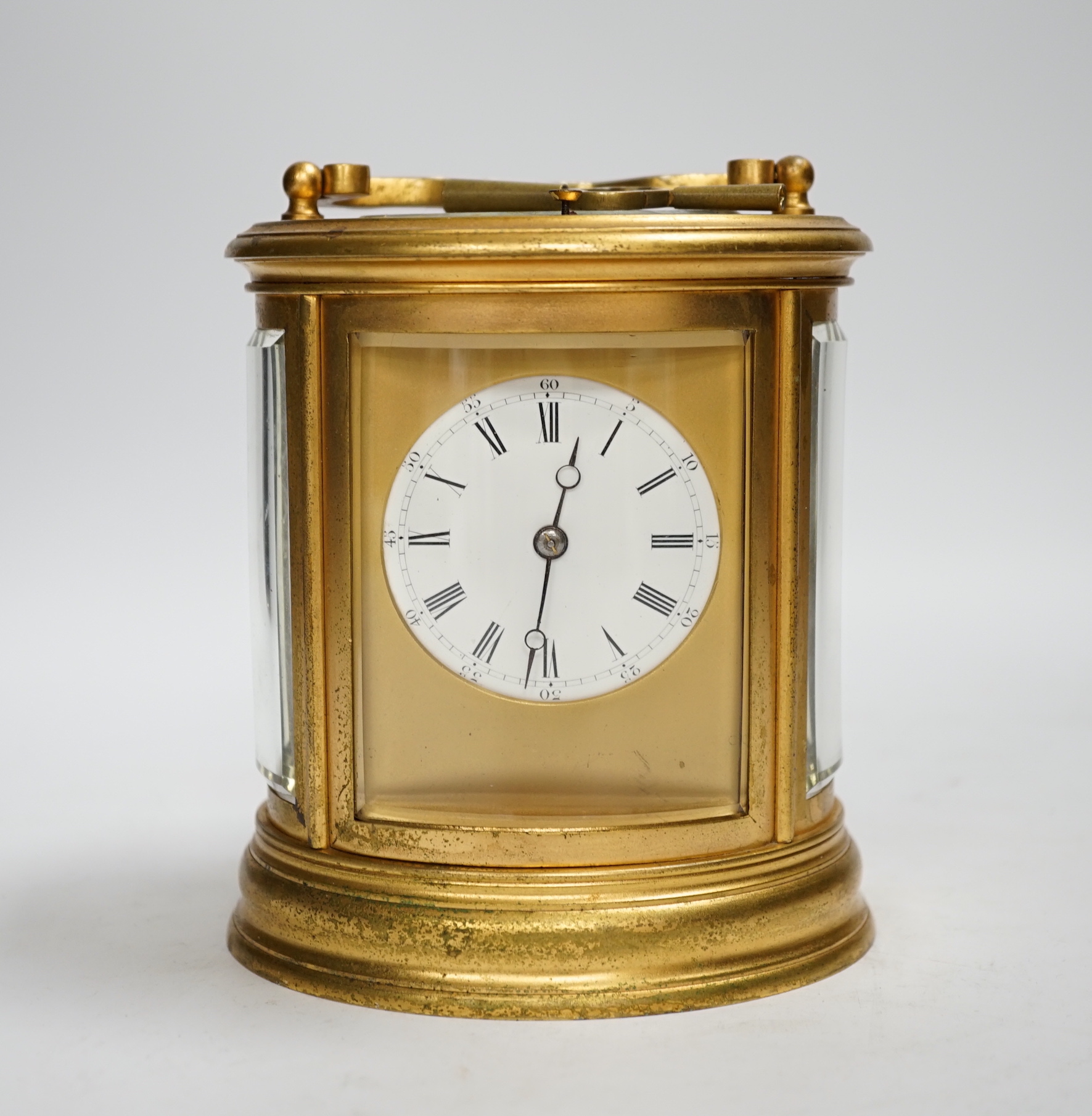 A Drocourt hour-repeating oval carriage clock, striking on a coiled gong, 13cm